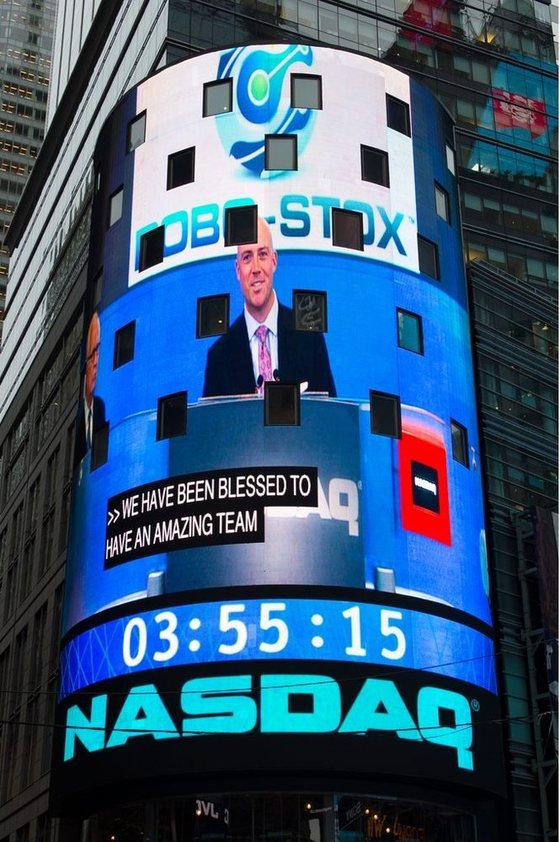 Rob Wilson on the NASDAQ Tower in Times Square at the ROBO-STOX launch